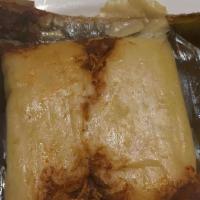 Tamales Oaxaquenos · 1 tamale wrapped in either corn or plantain leaves 1 tamale en oja De maiz o platano.