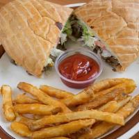 Steak Tortas · Mexican sandwich served with lettuce, tomato, avocado, beans, cheese, and sour cream.