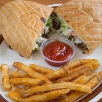 Barbacoa Tortas · Mexican BBQ. Mexican sandwich served with lettuce, tomato, avocado, beans, cheese, and sour ...