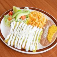 Chicken Enchiladas · Pollo. Three enchilada served with rice, beans, and red or green salsa.