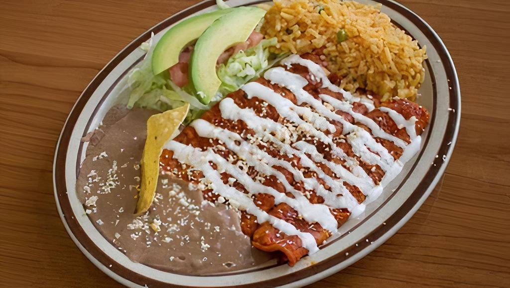 Cheese Enchiladas · Three enchilada served with rice, beans, and red or green salsa.