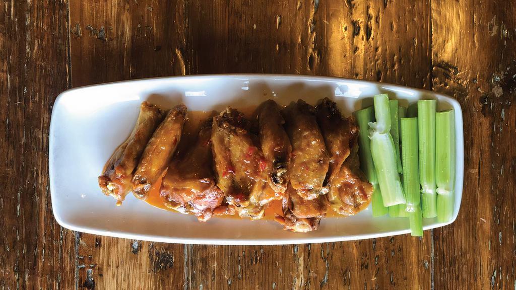 Wings · 10 bone-in wings served with celery and Maytag blue cheese dressing; with your choice of wing sauce.