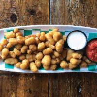Cheese Curds · Fresh white cheese curds hand breaded and deep fried.