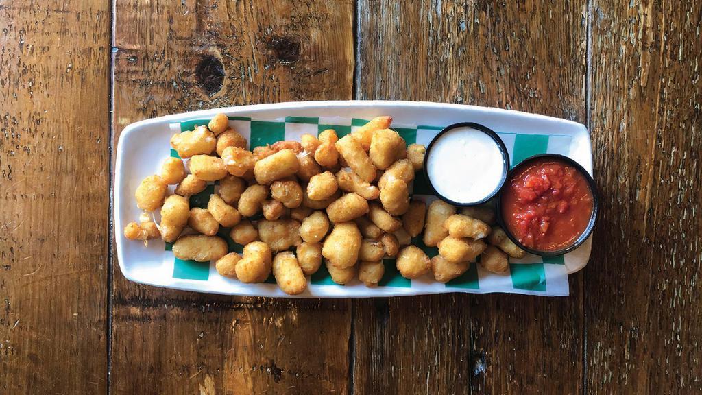 Cheese Curds · Fresh white cheese curds hand breaded and deep fried.