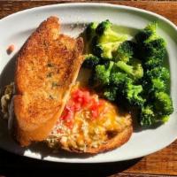 Lobster Melt · Lobster mixed with artichokes, mayo, onion and parmesan, topped with melted cheddar and dice...