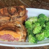 Rueben · A classic corned beef sandwich with Swiss cheese, sauerkraut and kicked up Thousand Island o...