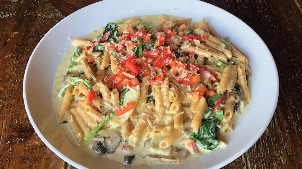 Roasted Penne · Roasted red peppers, Anaheim peppers, onions and mushrooms sautéed in garlic butter tossed with ancho cream sauce, gluten-free pasta and fresh spinach topped with parmesan cheese and freshly diced tomatoes.