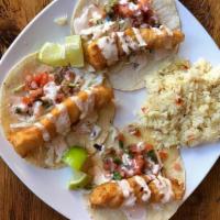 Fish Tacos · Three corn tortillas filled with Asian slaw and beer battered fish then topped with pico de ...