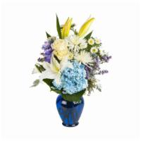 Sweet Serene By Bloomnation™ · This peaceful arrangement includes roses, Asiatic lilies, chrysanthemums, hydrangea, carnati...