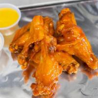 Regular Wings 6 · Our delicious 6 piece Jumbo chicken wings come with your favorite sauce of choice and a side...