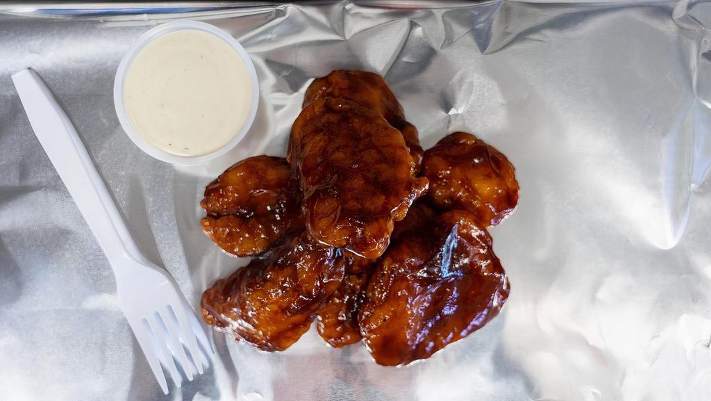 8 Boneless Wings · Our delicious Breaded  Boneless chicken wings come with your favorite sauce of choice and a side of Ranch,  Approx. 8-10 pieces.