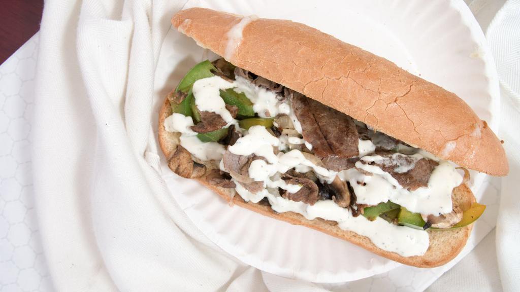 Philly Steak Sub · Fresh green peppers, fresh onions, fresh mushrooms, mayo and cheese.