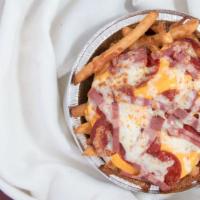 Loaded Fries · Fries with pepperoni and turkey bacon topped with mozzarella and melted cheddar cheese. Serv...