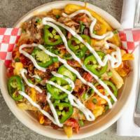 Hog Fries · Fries topped with carnitas, bacon, jalapenos, beer cheese sauce & pico de gallo
