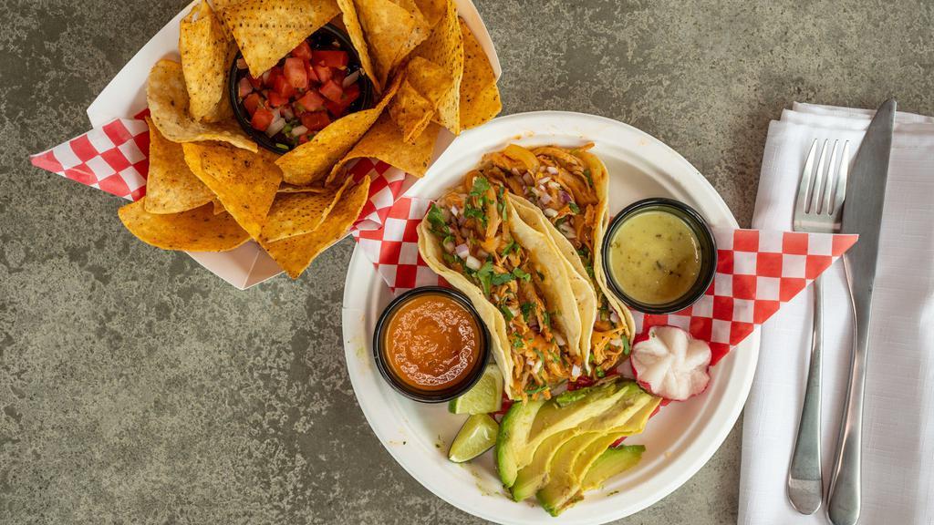 Street Tacos · 2 Soft shell corn or 2 Hard shell corn torillas topped with red onion, Avocado, cilantro, and your choice of meat.  Served with salsa verde, salsa roja, pico de gallo, & house made tortilla chips.