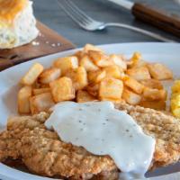 Country Fried Steak Breakfast* · 1110 Cal. A tender steak coated in our signature seasoned flour, then topped with our tradit...