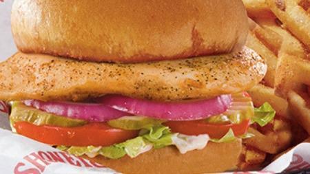 Chicken Sandwich · Fresh-grilled or crispy chicken breast served on a toasted bun with lettuce, tomatoes, pickles, and mayonnaise. Served with French fries.