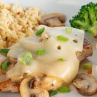 Mushroom Swiss Chicken · Grilled chicken breast brushed with garlic parmesan sauce, then topped with sautéed mushroom...