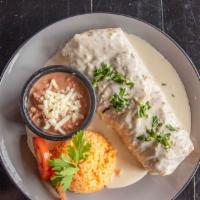 Burrito El Tacotorro · Your choice of meat, topped with cheese sauce.