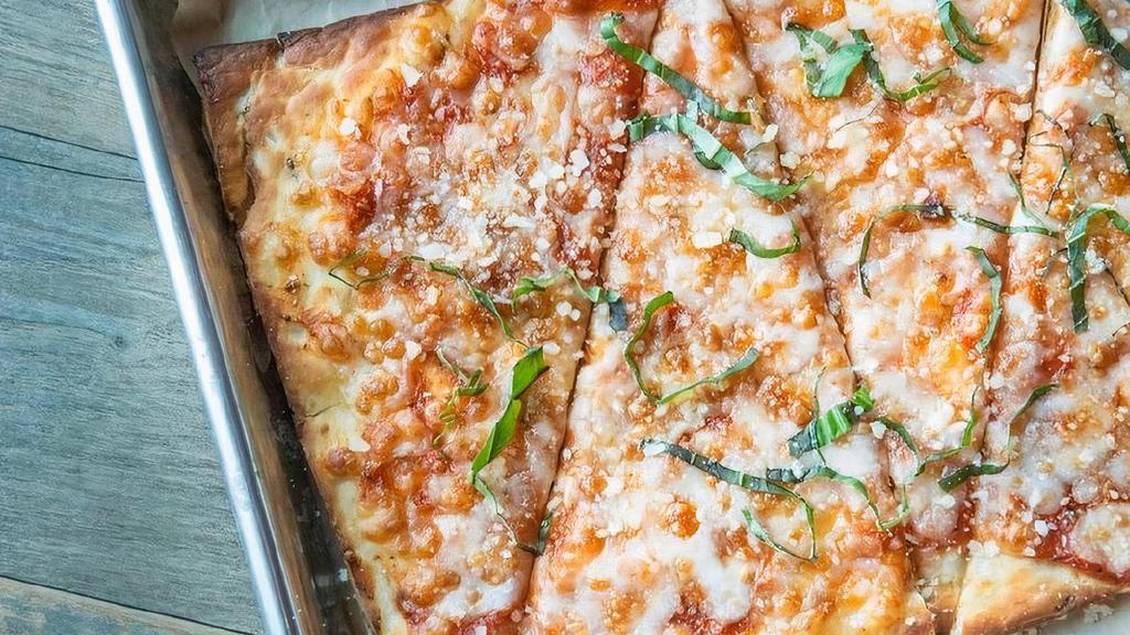 Margherita Flatbread · Cauliflower flatbread crust topped with house made pizza sauce, cheese and basil