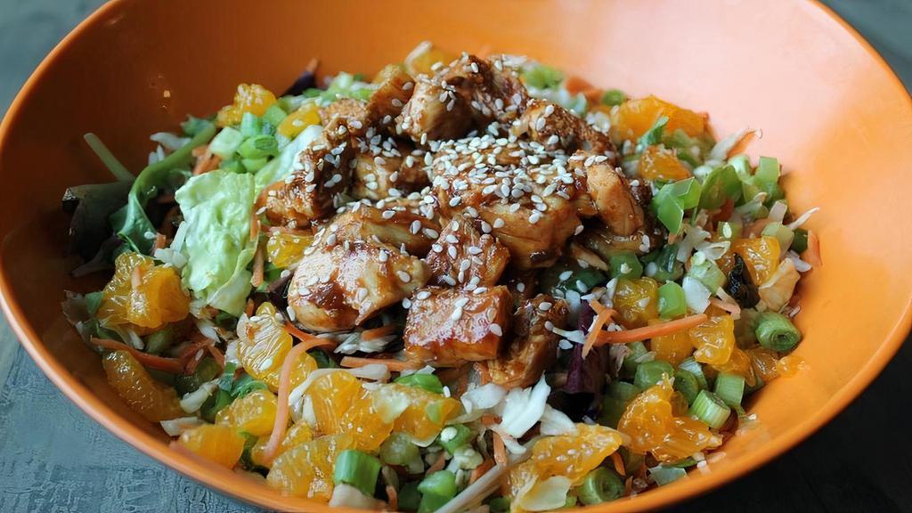 Korean Bbq Salad · Choice of grilled or breaded tenders smothered in Korean BBQ sauce over our sweet spring mix with cabbage slaw, bell peppers, mandarin oranges, shredded carrots, green onions and sesame seeds.  Served with our Asian sesame ginger dressing