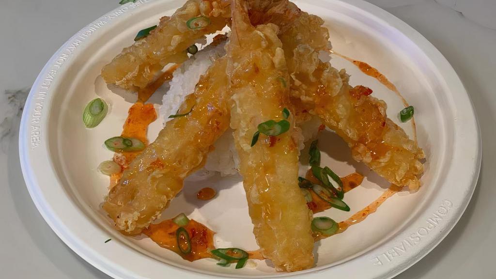 Shrimp Tempura · Five tempura battered fried shrimp, scoop of steamed rice, sweet chili sauce drizzle, green onion garnish.