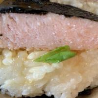 Spam Musubi · Grilled spam, pressed steamed rice, sweet teriyaki sauce, all wrapped in dried seaweed.