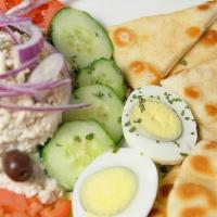 Tuna Or Chicken Salad Pita · With lettuce and tomatoes.