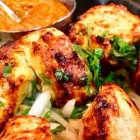 Chicken Tikka Malai · charcoal grilled boneless marinated chicken breasti mild