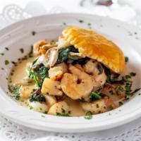 Feullette Of California Bay Scallops & Shrimp · Mushrooms, spinach, and lemon-thyme sauce.