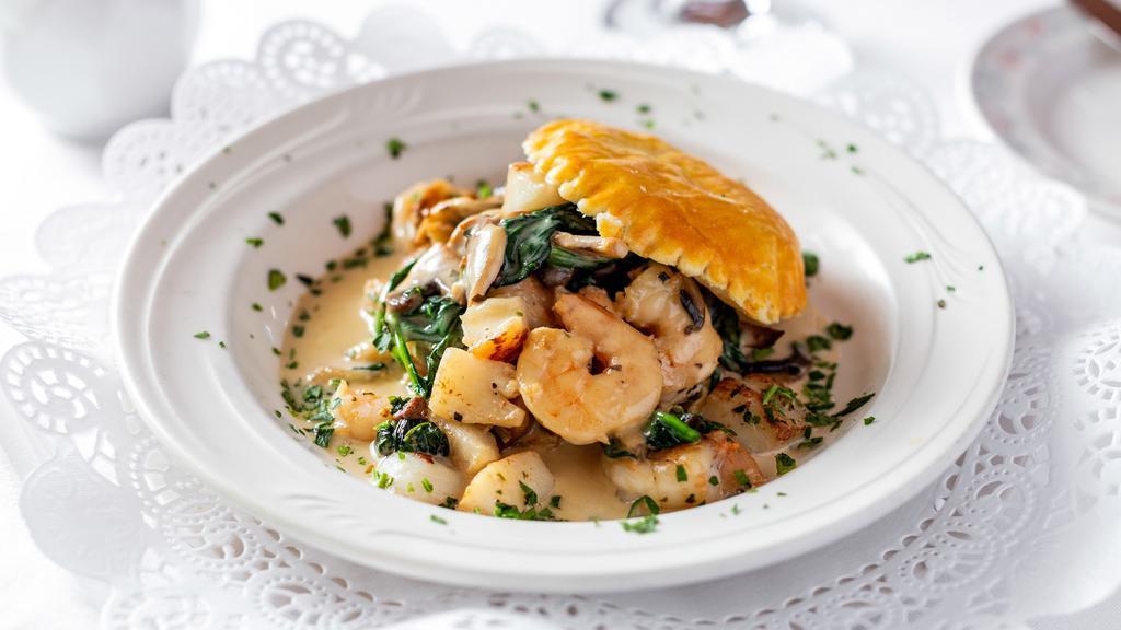 Feullette Of California Bay Scallops & Shrimp · Mushrooms, spinach, and lemon-thyme sauce.