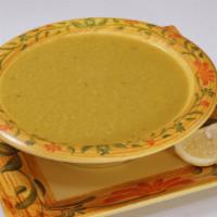 Lentil Soup · Served with a lemon wedge.