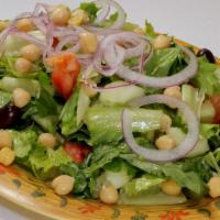 Shawarma Garden House Salad · Romaine lettuce, tomato, cucumber, onions, olives and chickpeas served with balsamic vinaigr...