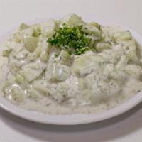 Cucumber Yogurt Salad · Fresh chopped cucumbers with homemade yogurt and a hint of garlic and mint.