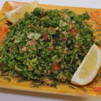 Tabouleh Salad · fresh chopped parsley chopped tomatoes cracked wheat onions lemon salt and olive oil