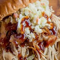 Pulled Chicken Sandwich · Whole chicken seasoned with our house rub, smoked for up to 6 hours, and recommended with ou...