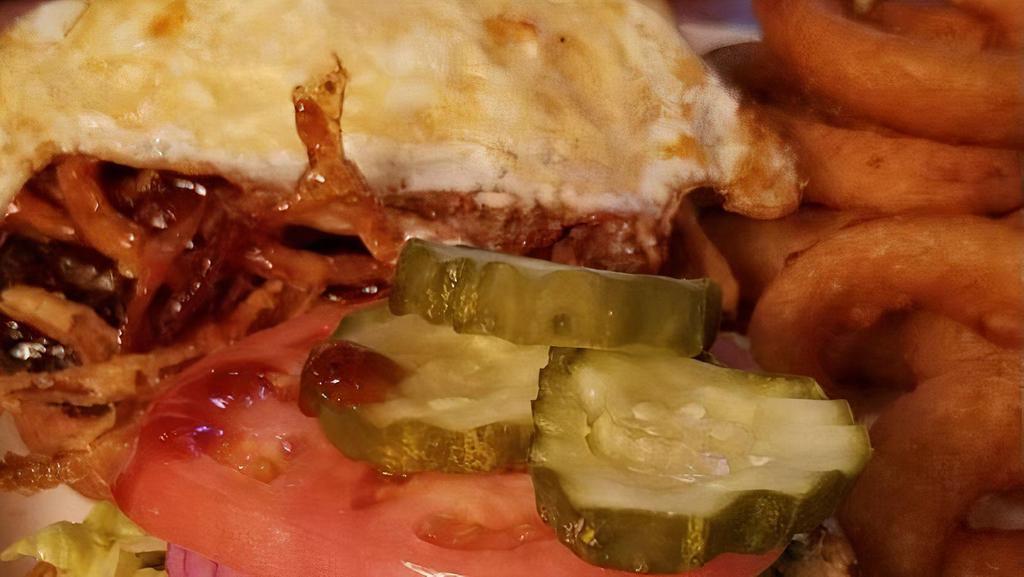 The Western Ave Burger · #1 Seller - smothered in our homemade Guinness BBQ sauce, topped with crispy onions, bacon and melted cheddar.


Consuming raw or undercooked meats, poultry, seafood, shellfish or eggs may increase your risk of foodborne illness.