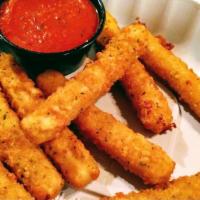 Mozzarella Cheese Sticks · Real Wisconsin Mozzarella dipped in Italian garlic butter breading and fried, served with ma...