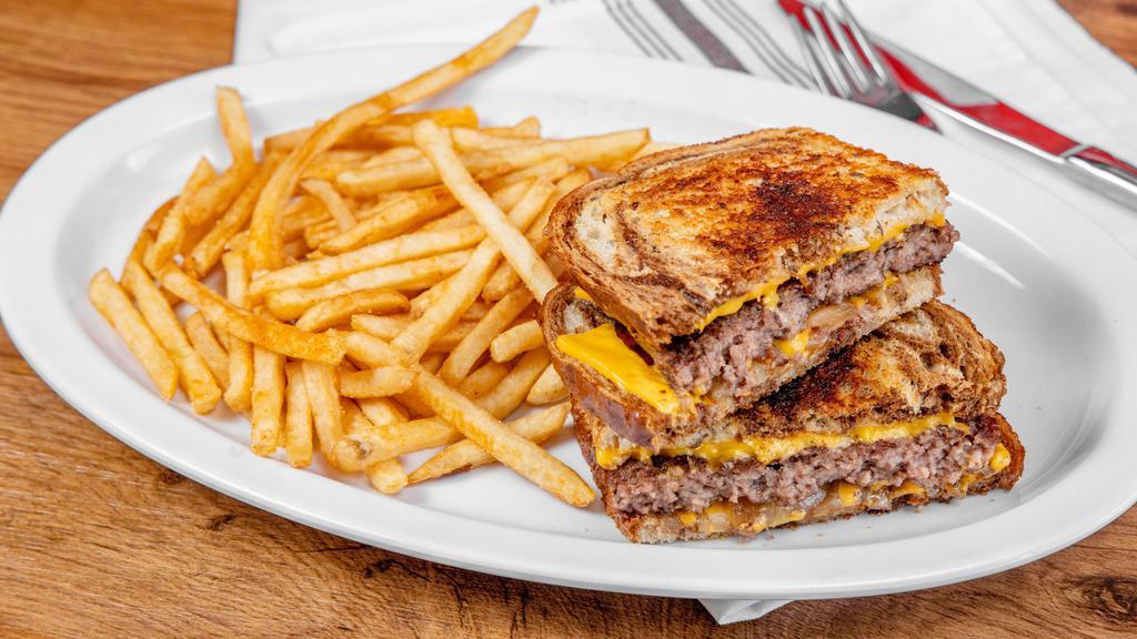 Patty Melt On Rye · Cal. 393 Grilled Marble Rye, buttered and topped with a beef patty, cheddar cheese & grilled onions.