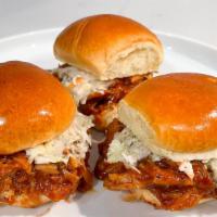 Pulled Pork Sliders (3) · Pulled pork tossed in Smokeheads Carolina BBQ Sauce, topped with our house slaw. Served on a...