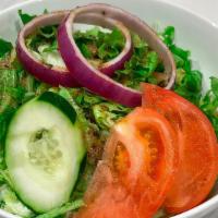 House Salad · Lettuce blend, red onions, cucumber. Gluten-free.