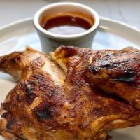 Half Bbq Smoked Chicken · We start with an overnight brine, a dry rub and then slow smoke them at 225° with our signat...