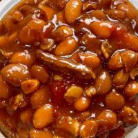 Brisket Baked Beans · Our Brisket Baked Beans include plenty of burnt ends, thick cut bacon, pinto beans, a lil’ b...