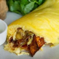 The Omelette You Can'T Refuse · Bacon, White Cheddar, Sour Cream, Potatoes. No Substitutions. Served with choice of toast an...