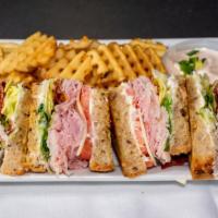 Clubhouse · Turkey, ham, bacon, swiss cheese, lettuce, tomato & mayonnaise served on grilled seven grain...