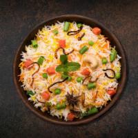 'Licious Veggie Biryani · Long grain basmati rice cooked with garden fresh vegetables in a blend of indian exotic spic...