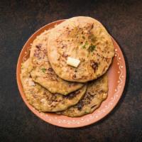 Stuffed Flatbread  · Mildly spiced potatoes filled in whole wheat flatbread and pan-fried.
