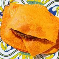 Beef Patty (1Pc) · Flaky pastry stuffed with spiced beef.
