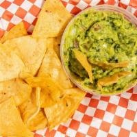 Guacamole And Chips · Made in-house chips and guacamole with fresh ingredients.