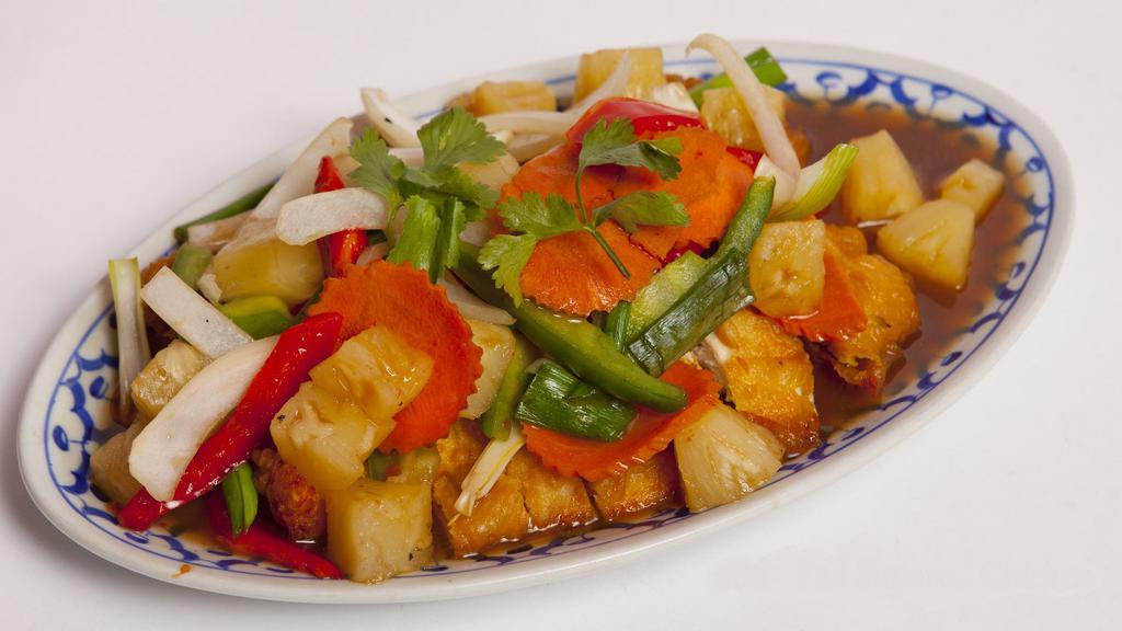 #86 Pad Suparod · Sautéed pineapple, onions, & bell peppers over fried chicken